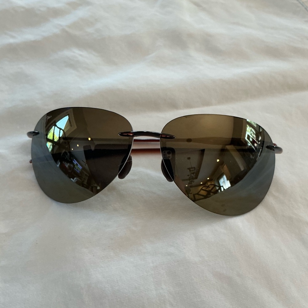 Maui Jim brown rimless aviator style ladies sunglasses. No scratches.